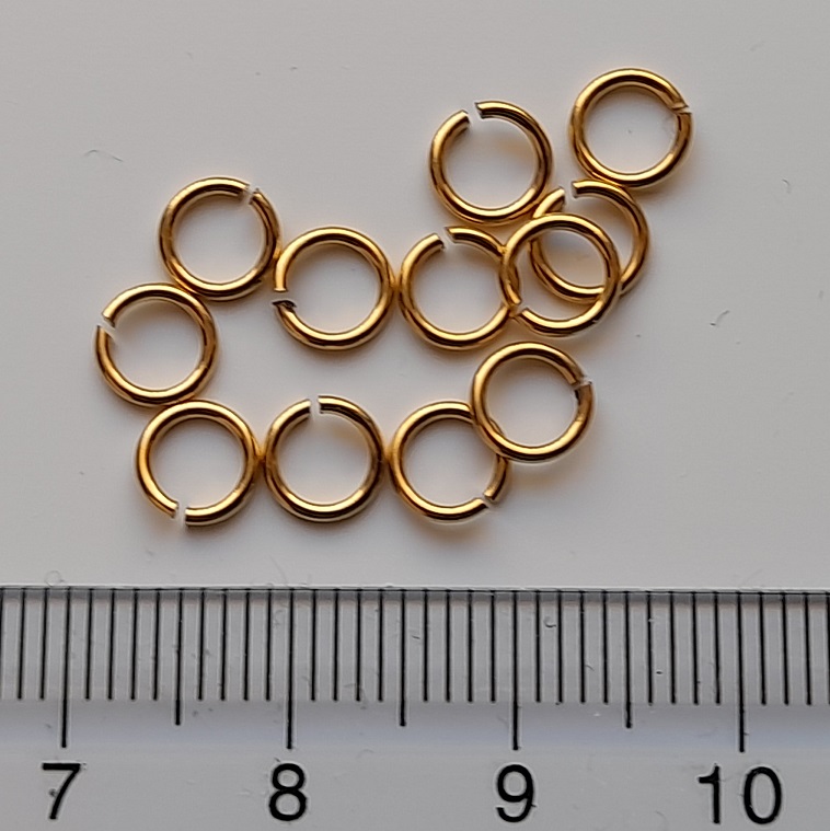    *Sesonkitarjous* V�lirengas, messinki, py�re� 7.2mm (ulkomitta) langan paksuus 1.0mm, kullan keltainen, 50 kpl