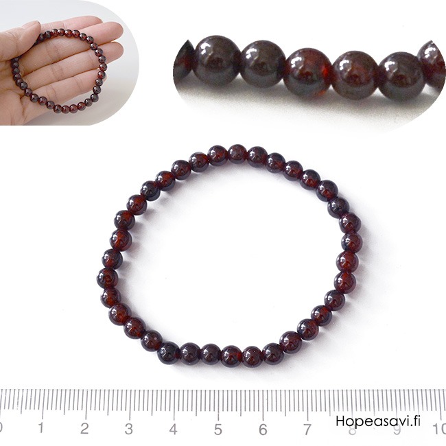 Kivihelmi, Granaatti (Garnetti), keskitumma helmi� noin 5-6mm, noin 35 kpl, elastinen nauha (esim. rannekoru)